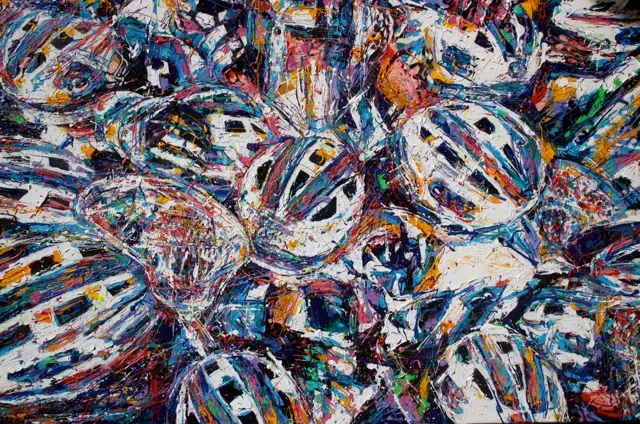 A painting of many bicycles in the shape of helmets.