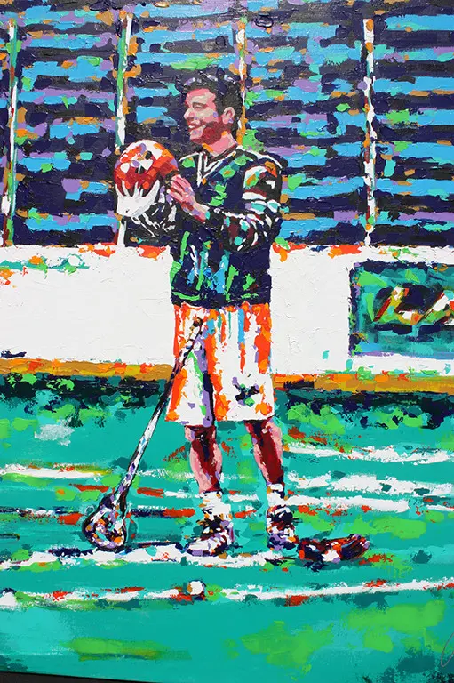 A painting of a man holding a football