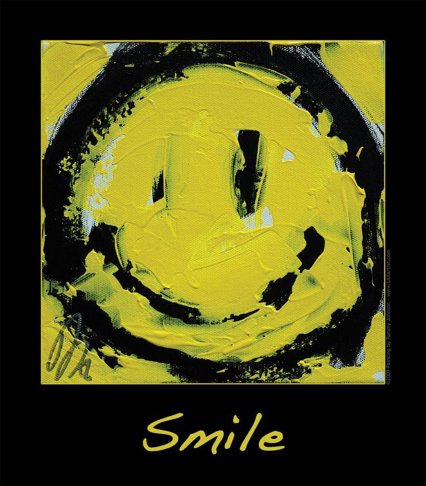 A yellow and black smiley face with the word smile written underneath it.